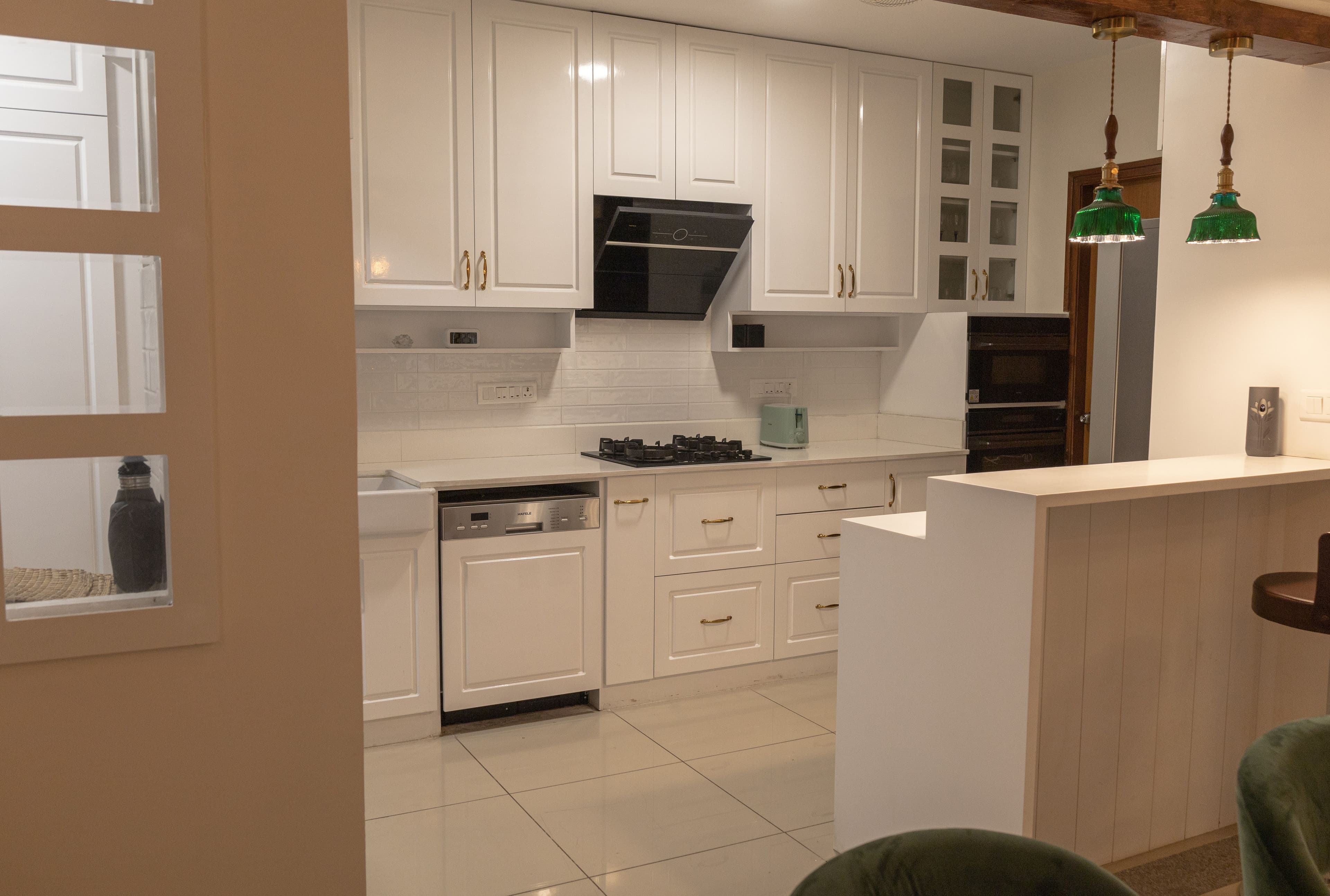 Kitchen with shaker cabinets and integrated storage
