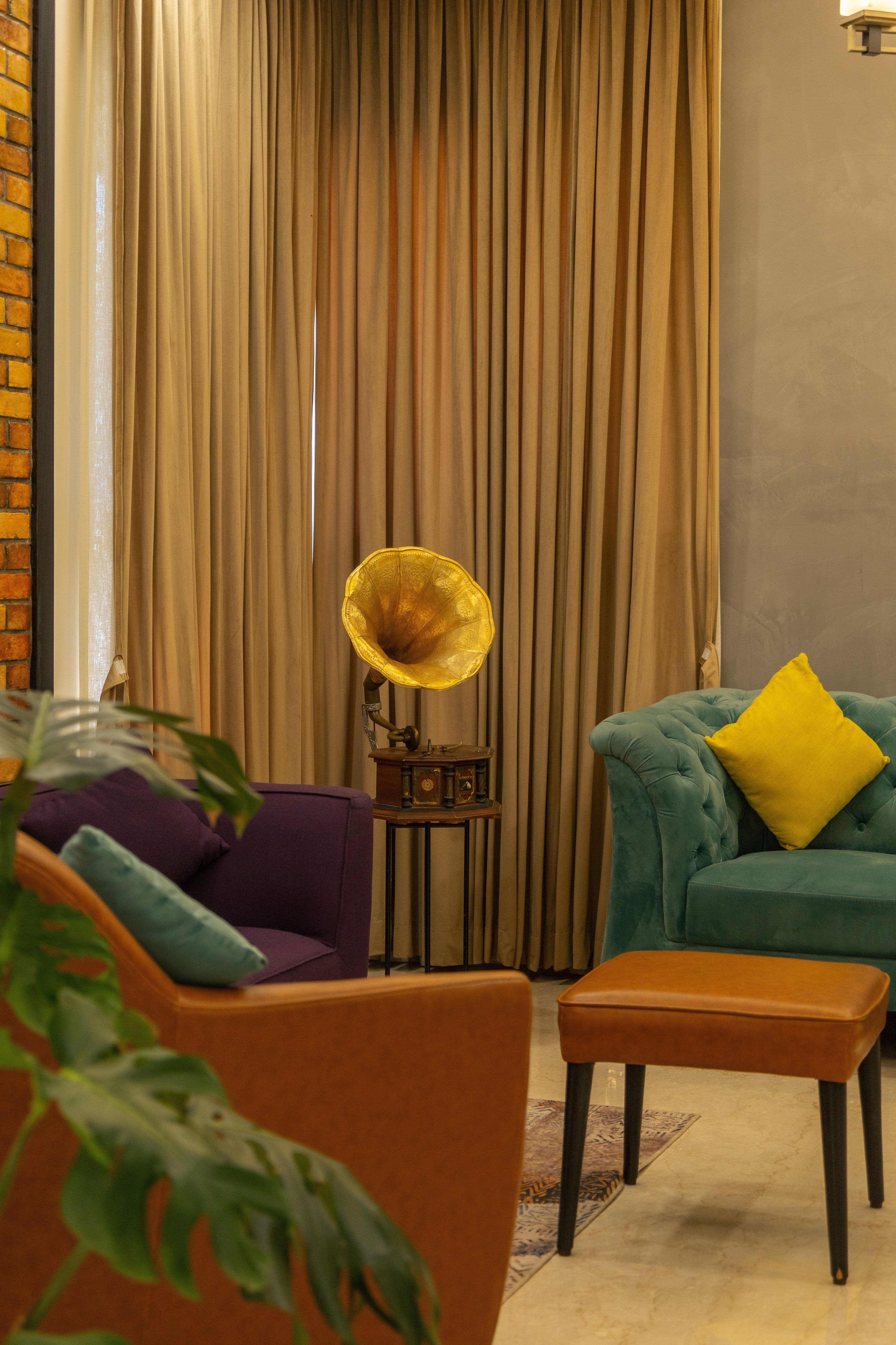 Living room detail — gramophone close-up and seating arrangement
