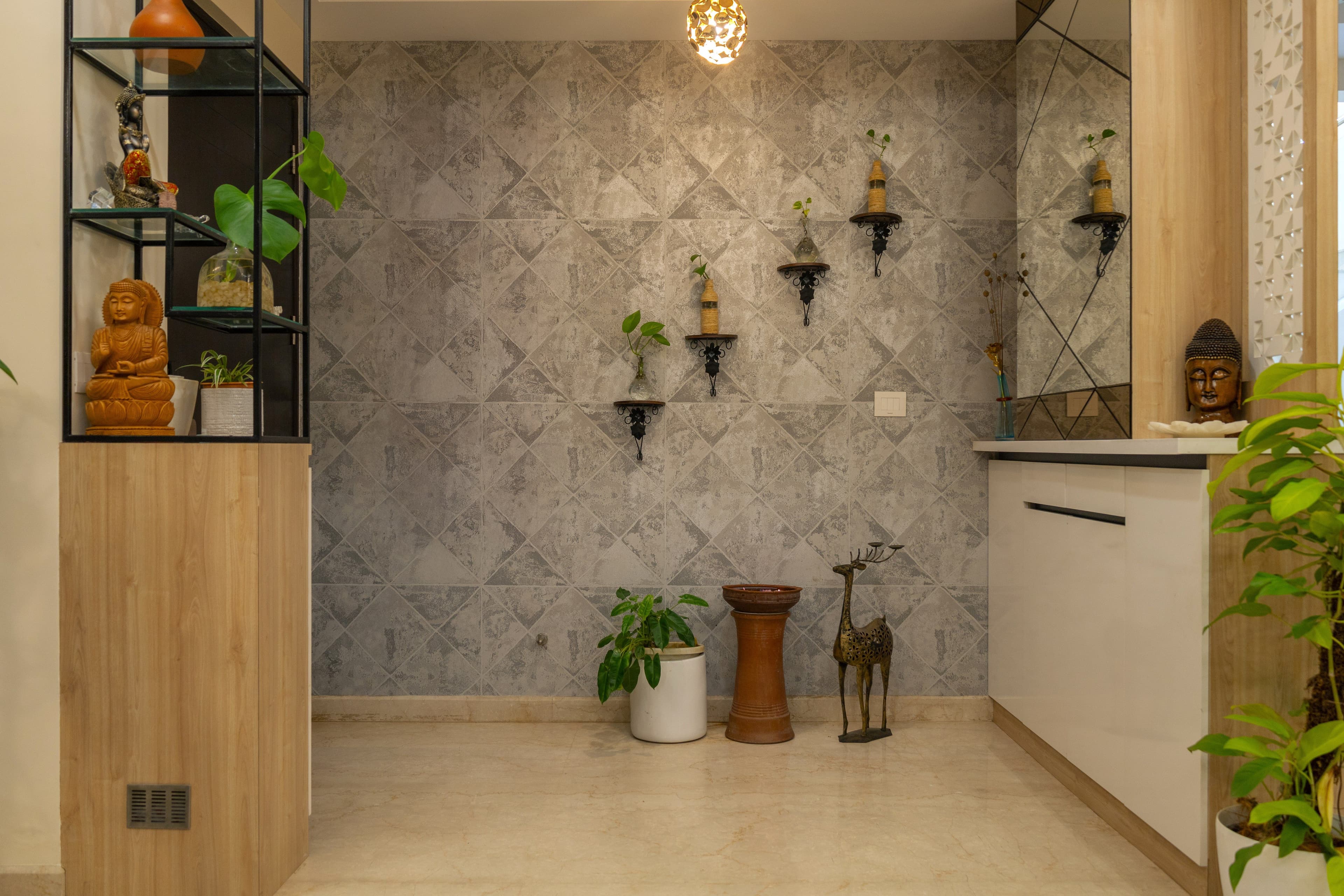 Home foyer with decorative stone wall and shelving