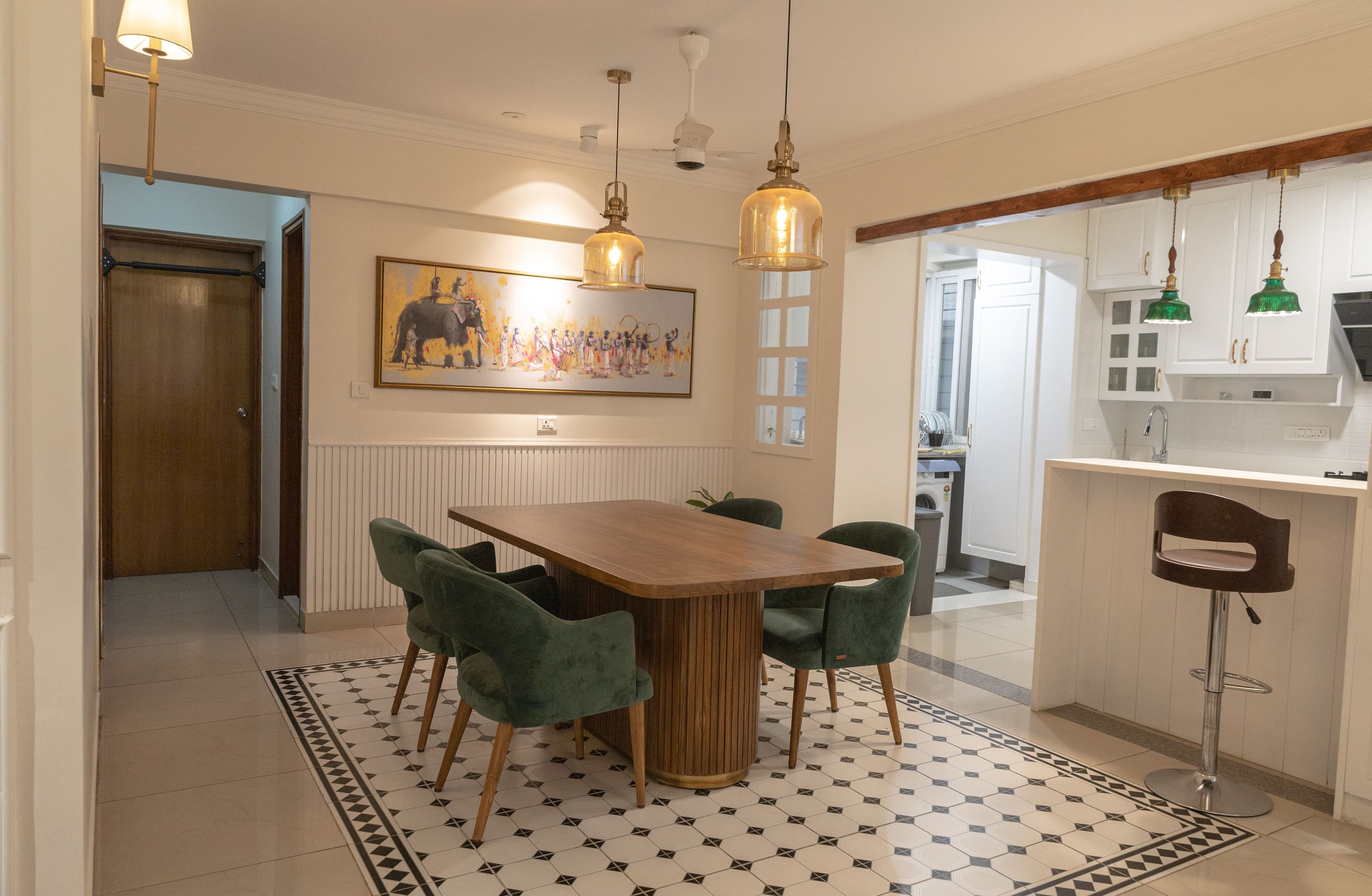 Custom dining room with green velvet chairs