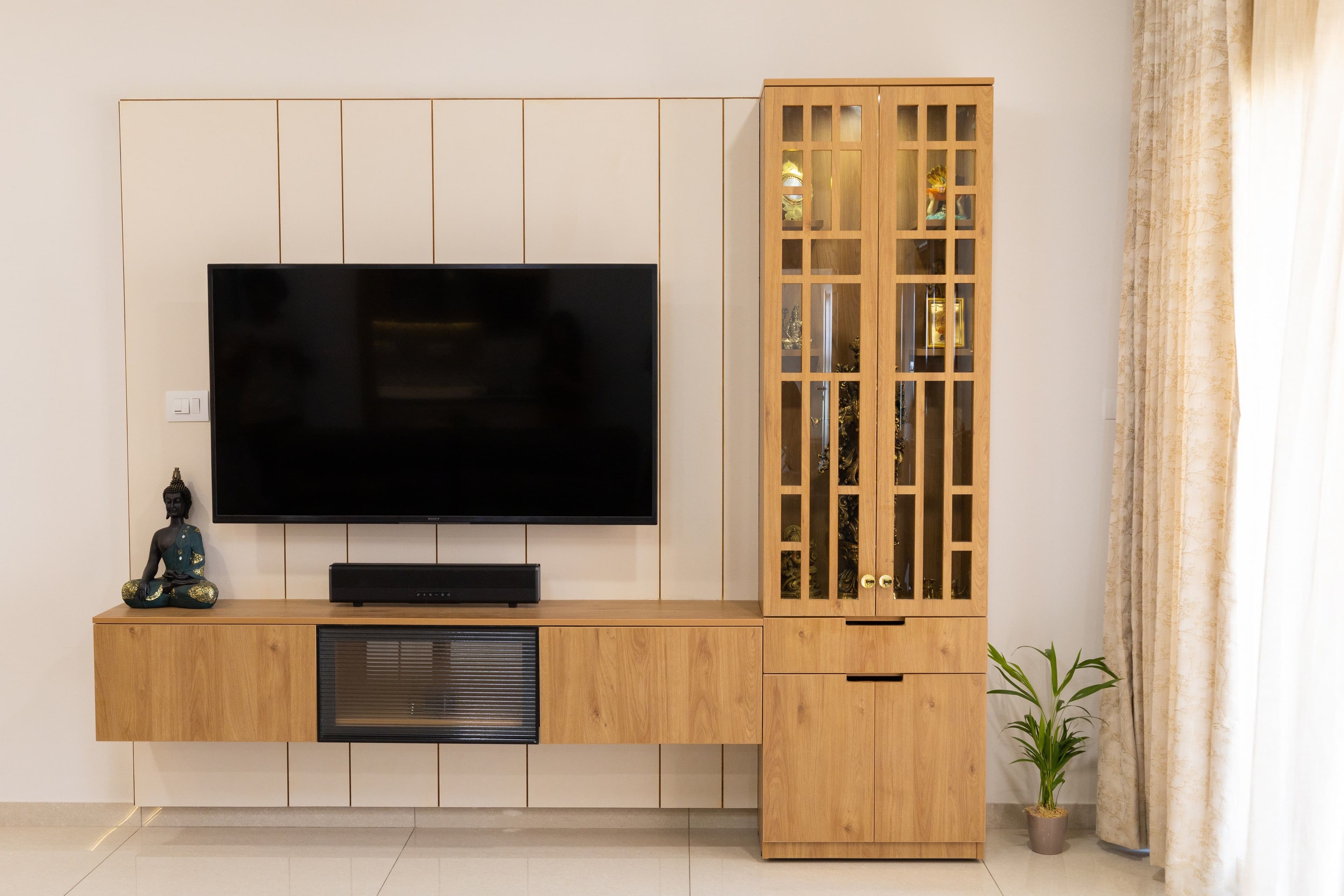 Custom TV wall with vertical-groove panel and display cabinet